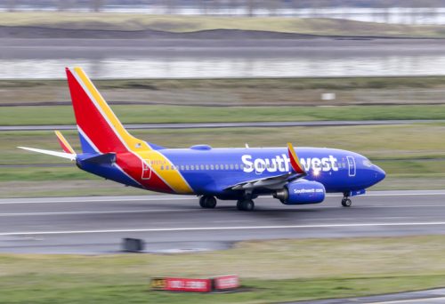 Southwest Airlines Boeing 737-800 rolling away on the runway.